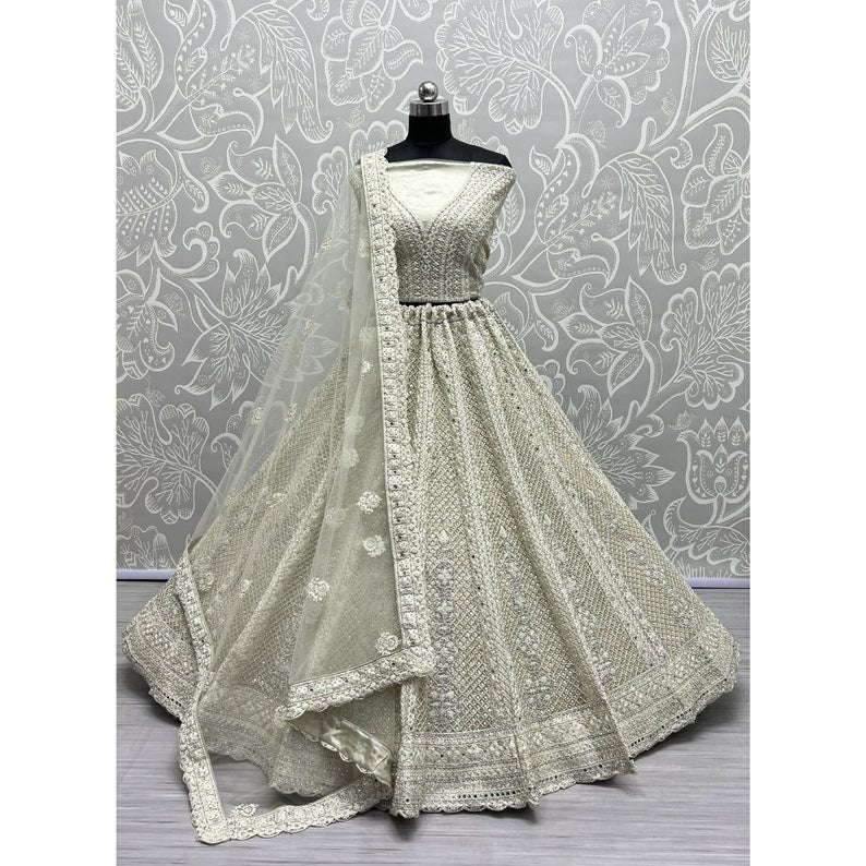 Steel Golden Colour Lehenga Choli with Net Dupatta