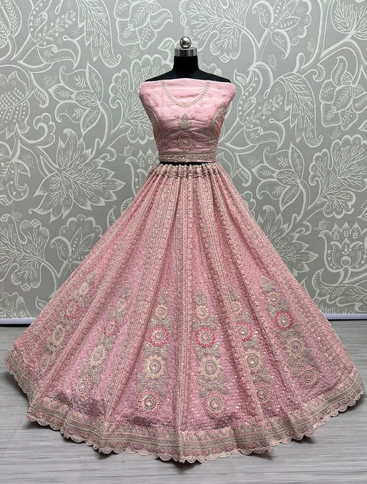 Net Fabric Bridal Lehenga Choli With Embroidery Work In Pink Color