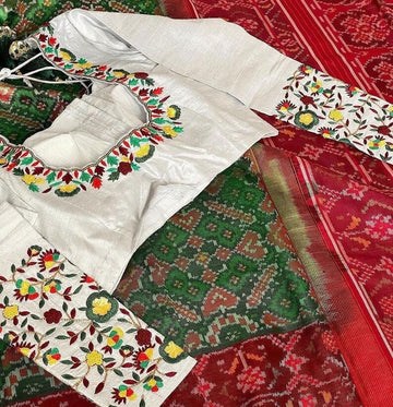 White linen blouse with traditional dark grey - red pattern