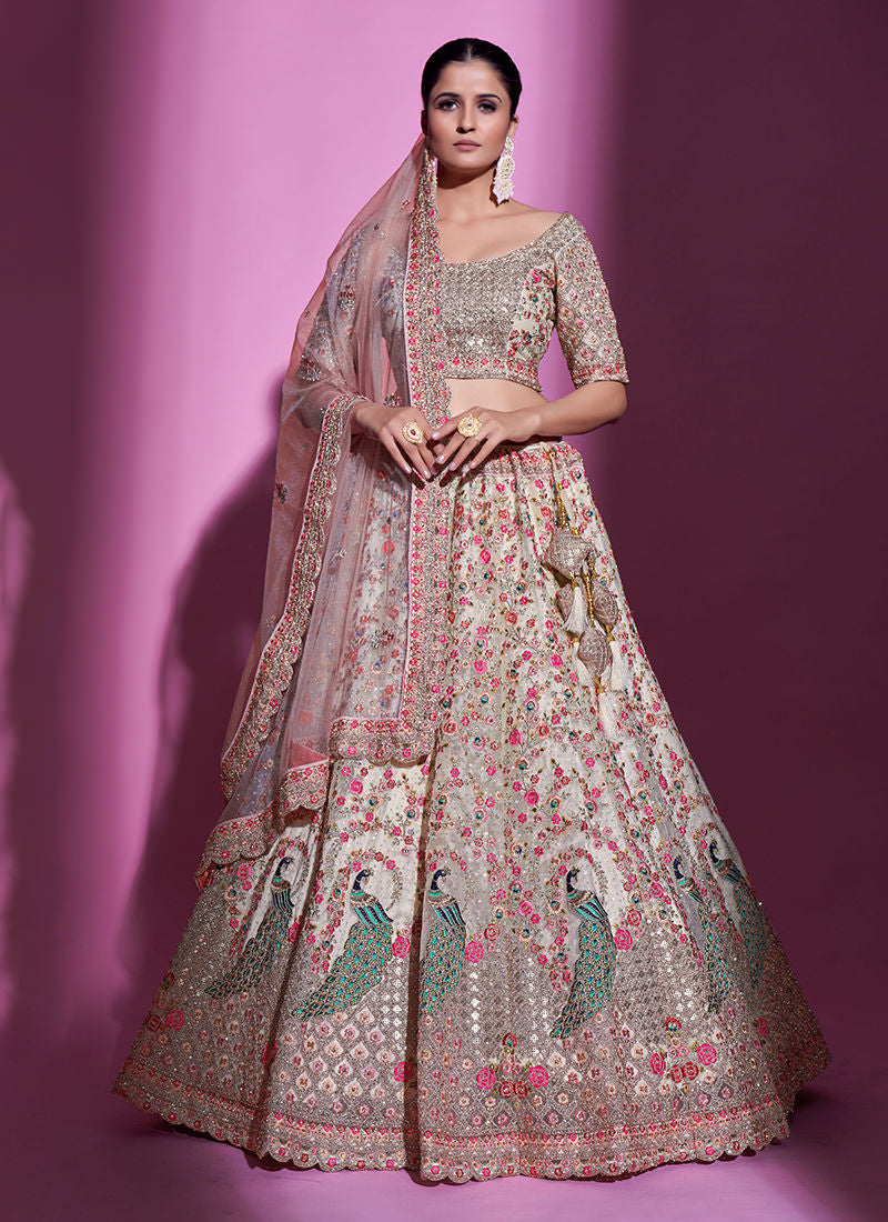 Unimaginable Cream Sequins Embroidered Soft Net Lehenga Choli