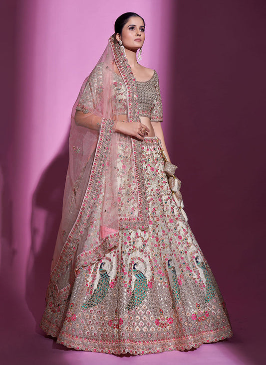 Unimaginable Cream Sequins Embroidered Soft Net Lehenga Choli