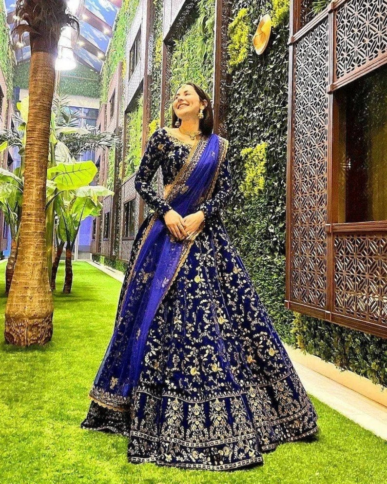 Bollywood Model Velvet Embroidery Wedding Lehenga in Blue Color