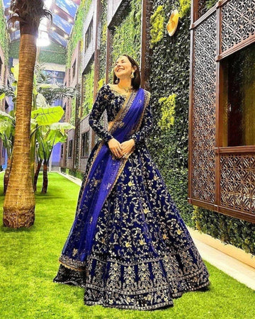 Bollywood Model Velvet Embroidery Wedding Lehenga in Blue Color