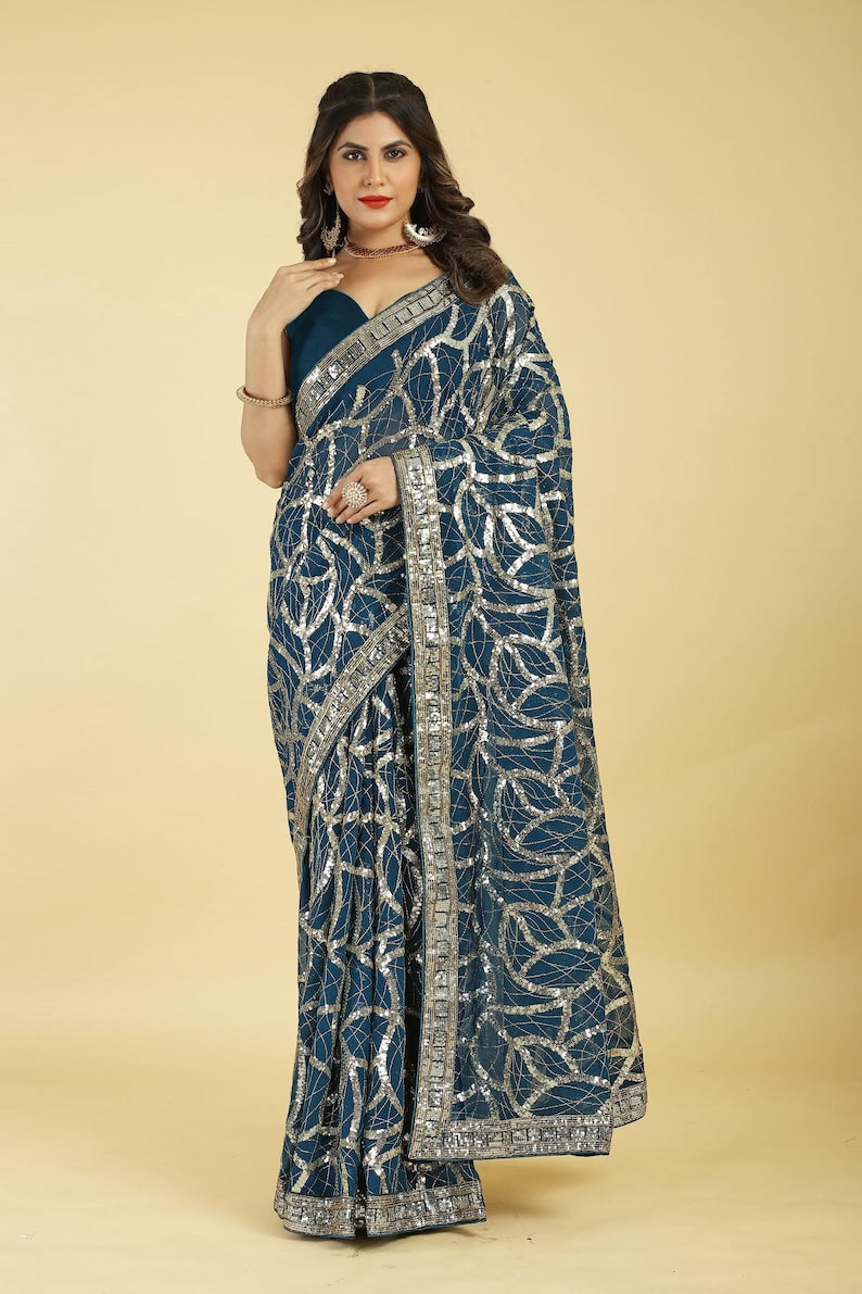 Women Embellished Georgette Saree