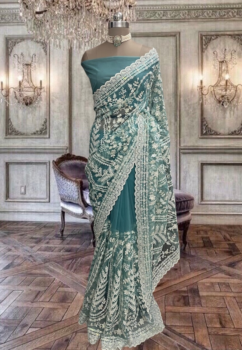 Beautiful Turquoise Blue Net Saree with Threads