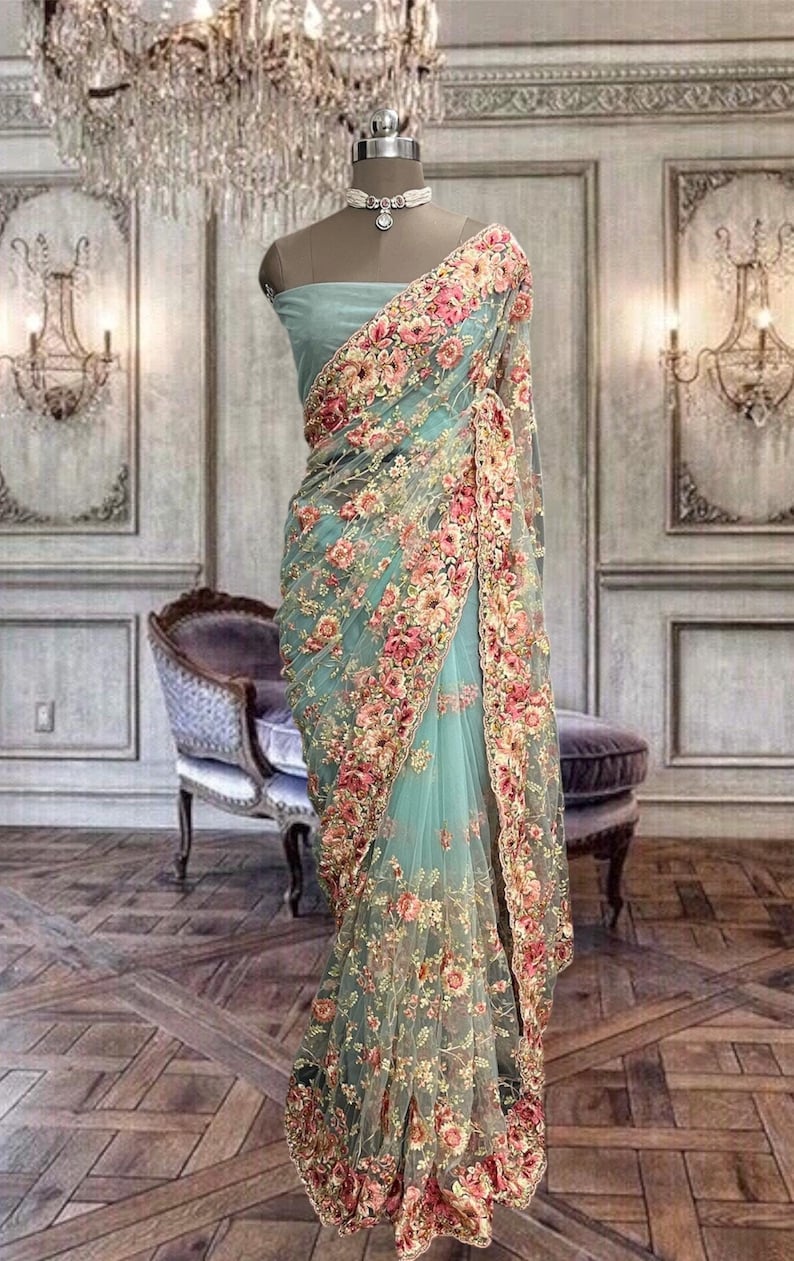 Beautiful Cyan Blue Colour Net Saree with Multi Colour Floral Embroidery