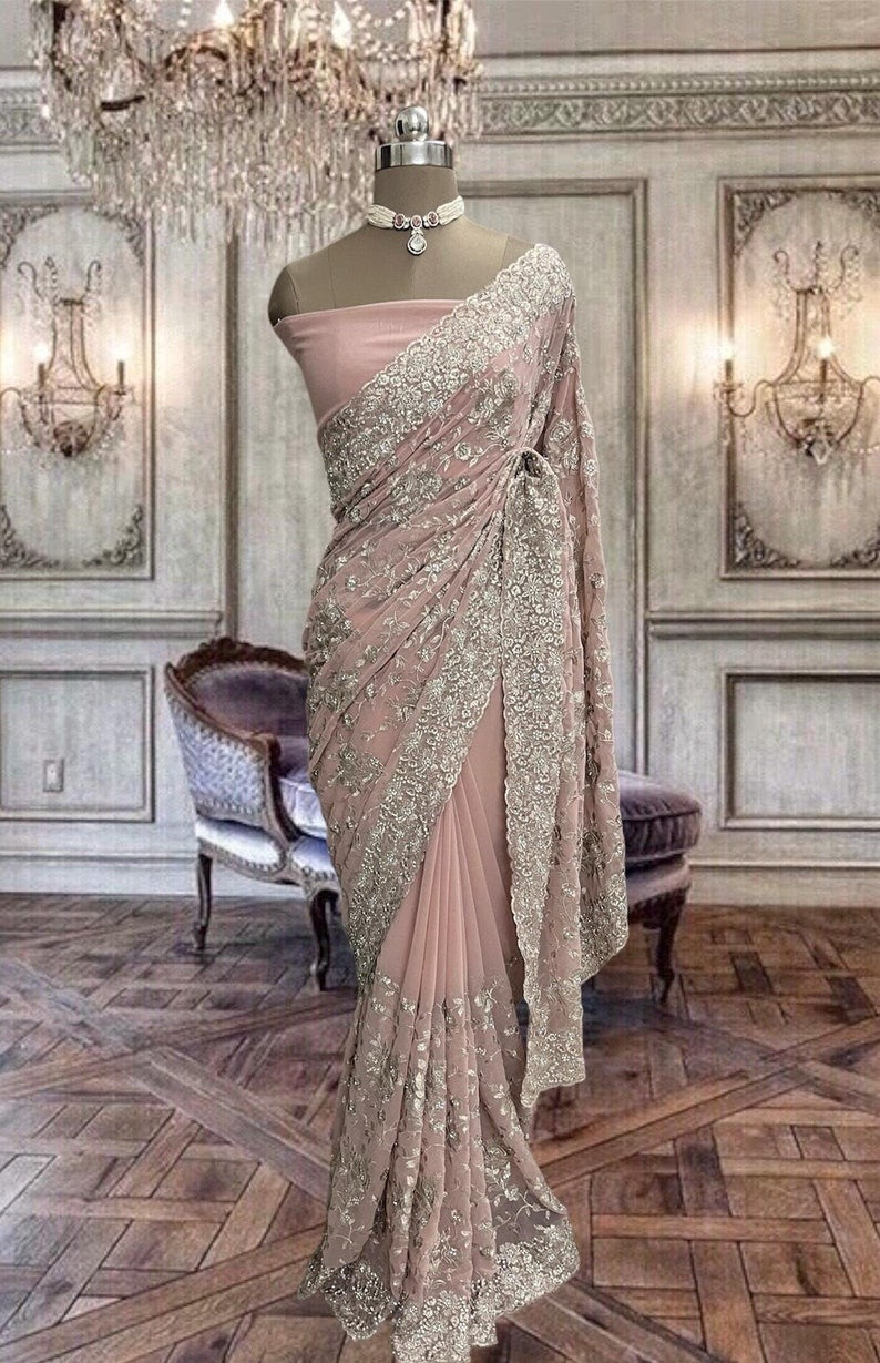Beautiful Peach Pink Net Saree