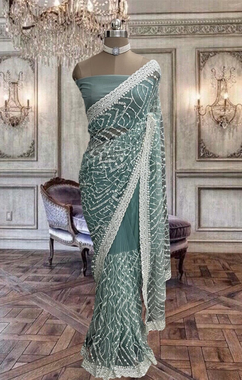 Beautiful Turquoise Blue Net Saree with Thread