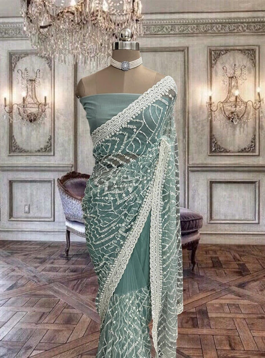 Beautiful Turquoise Blue Net Saree with Thread