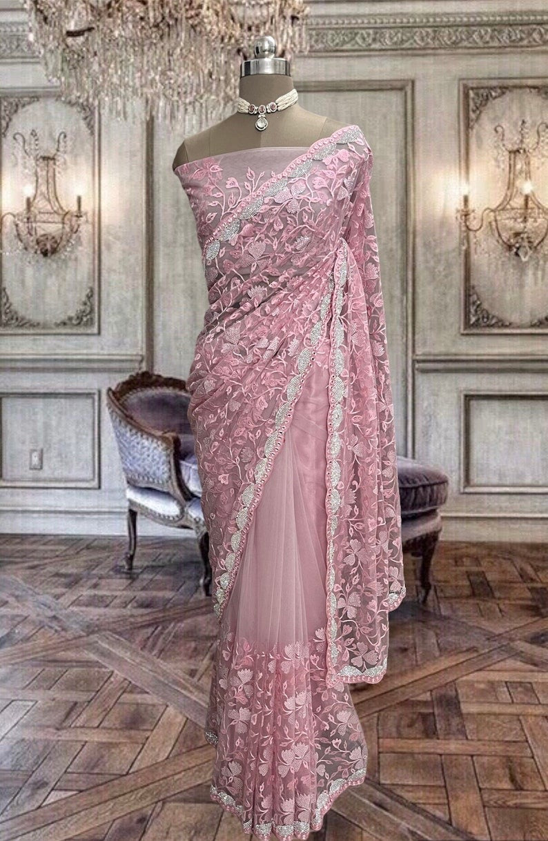 Beautiful Peach Pink Net Saree With Coloured Threads