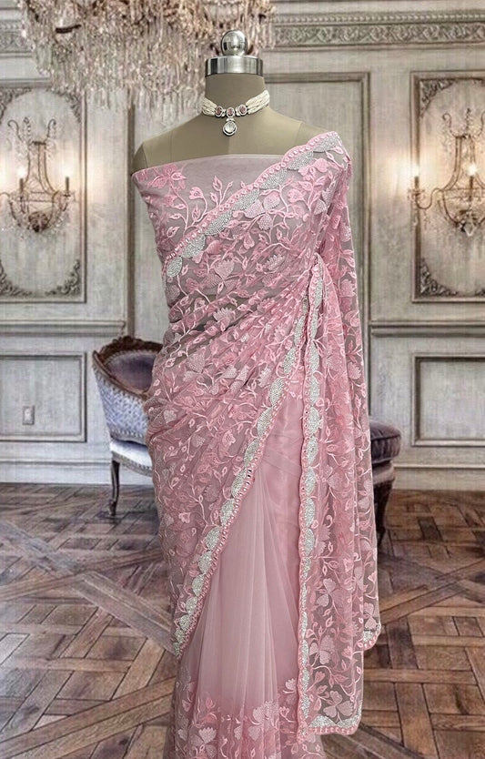 Beautiful Peach Pink Net Saree With Coloured Threads