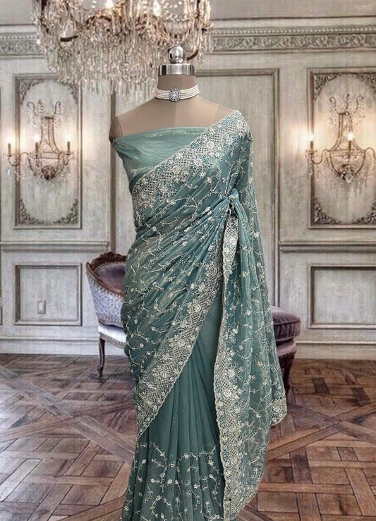 Beautiful Shiny Dull Blue Net Saree with Glitter Work