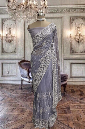 Beautiful Light Violet Colour Net Saree with Zari and Stone Work