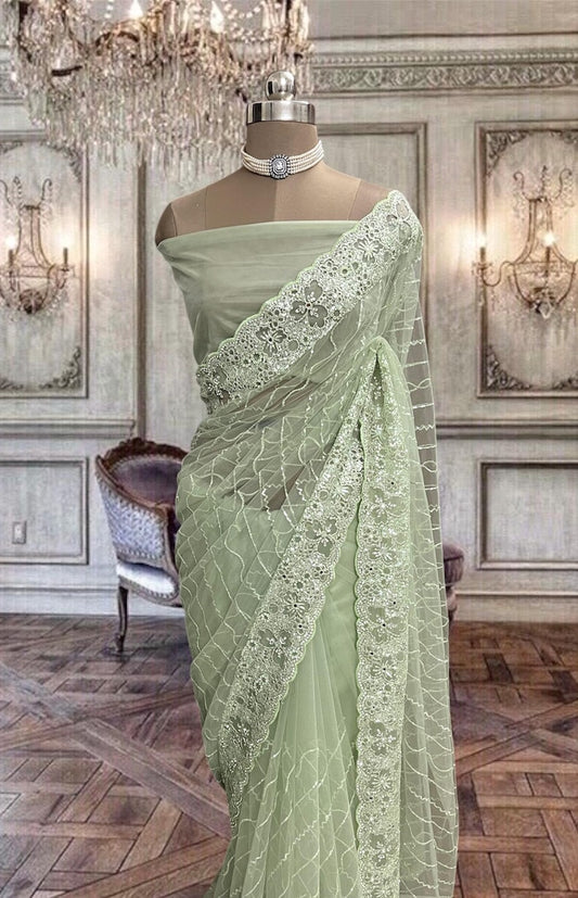 Beautiful Pastel Green Net Saree with Sequins Work