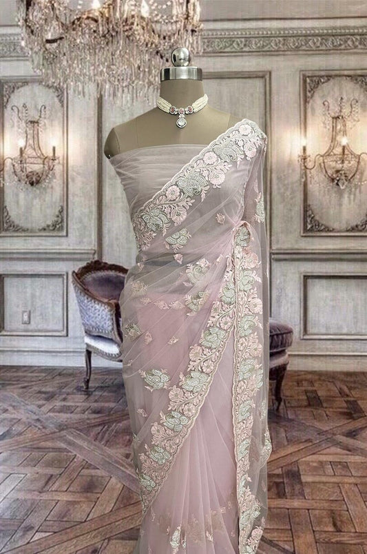 Beautiful Pastel Pink Net Saree with Thread and Stone Work