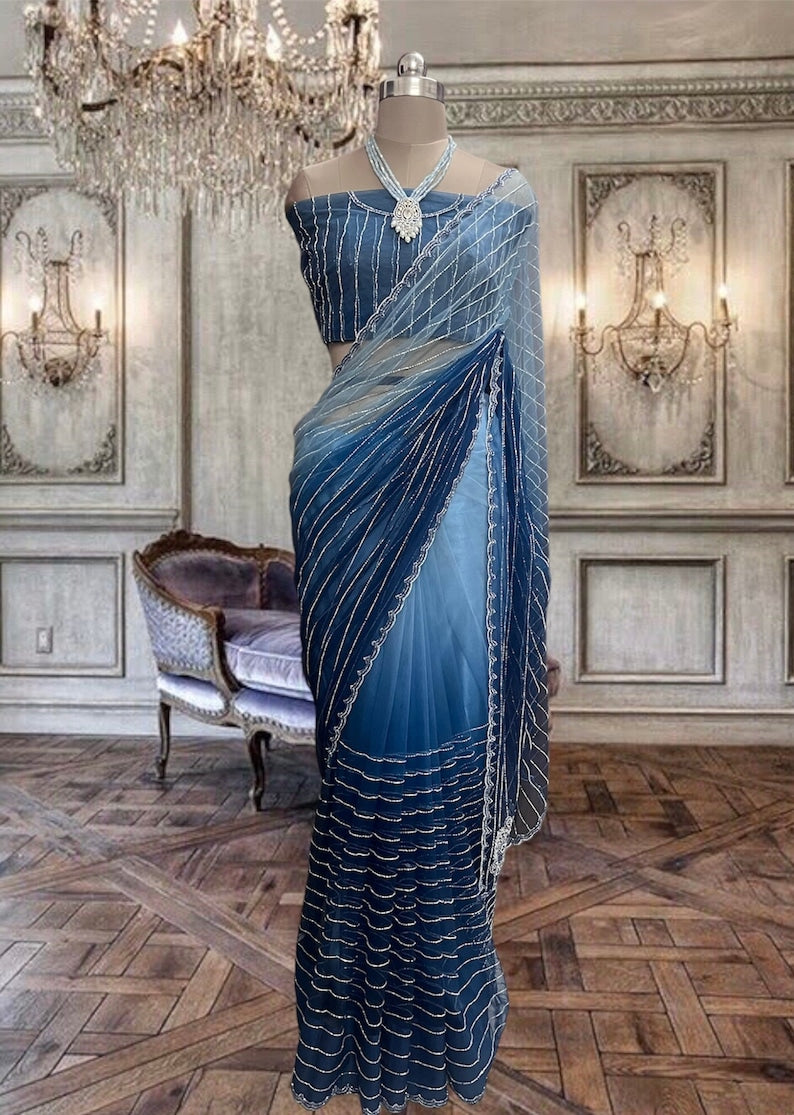 Beautiful Blue Shaded Hand Embroidered Net saree