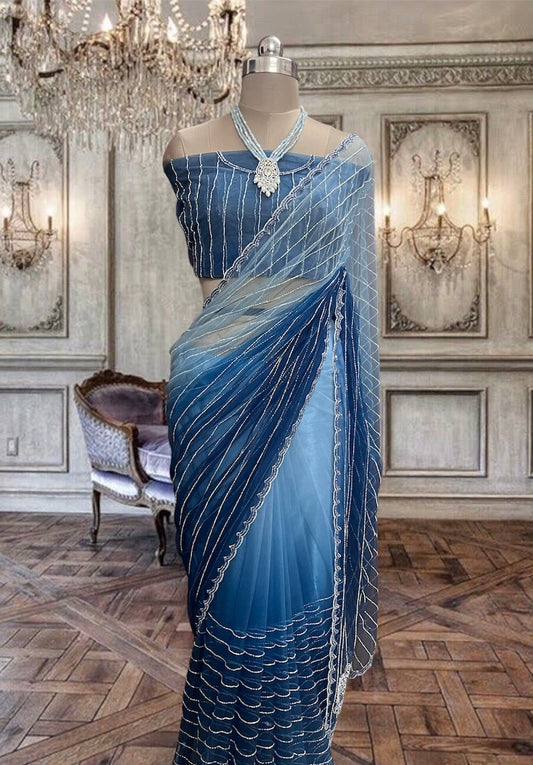 Beautiful Blue Shaded Hand Embroidered Net saree