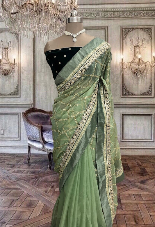 Beautiful Dull Green Organza Saree with Broad Laces