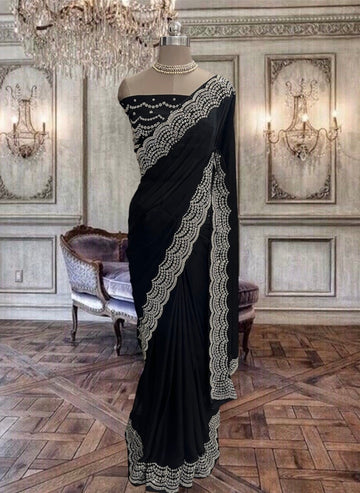 Beautiful black chinon georgette saree with copper kundan work