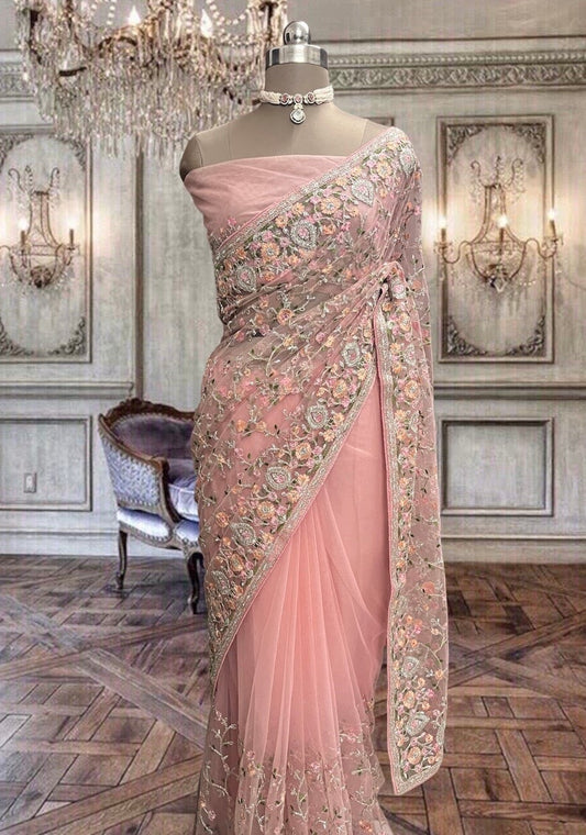Beautiful Peach Pink Net Saree with Colorful Thread Work